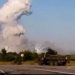 Russia vows to respond after Ukrainian drone attack sets on fire alleged munitions warehouse