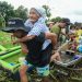 Tropical Storm Trami brings severe flooding and landslides to the Philippines, at least two dozen dead