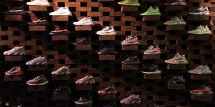 Adidas to cut up to 500 jobs after posting better-than-expected holiday profits