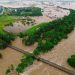 One dead, thousands evacuated as northeast Australia battles massive floods